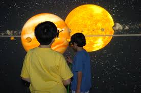 Students learning about planets by virtual Reality